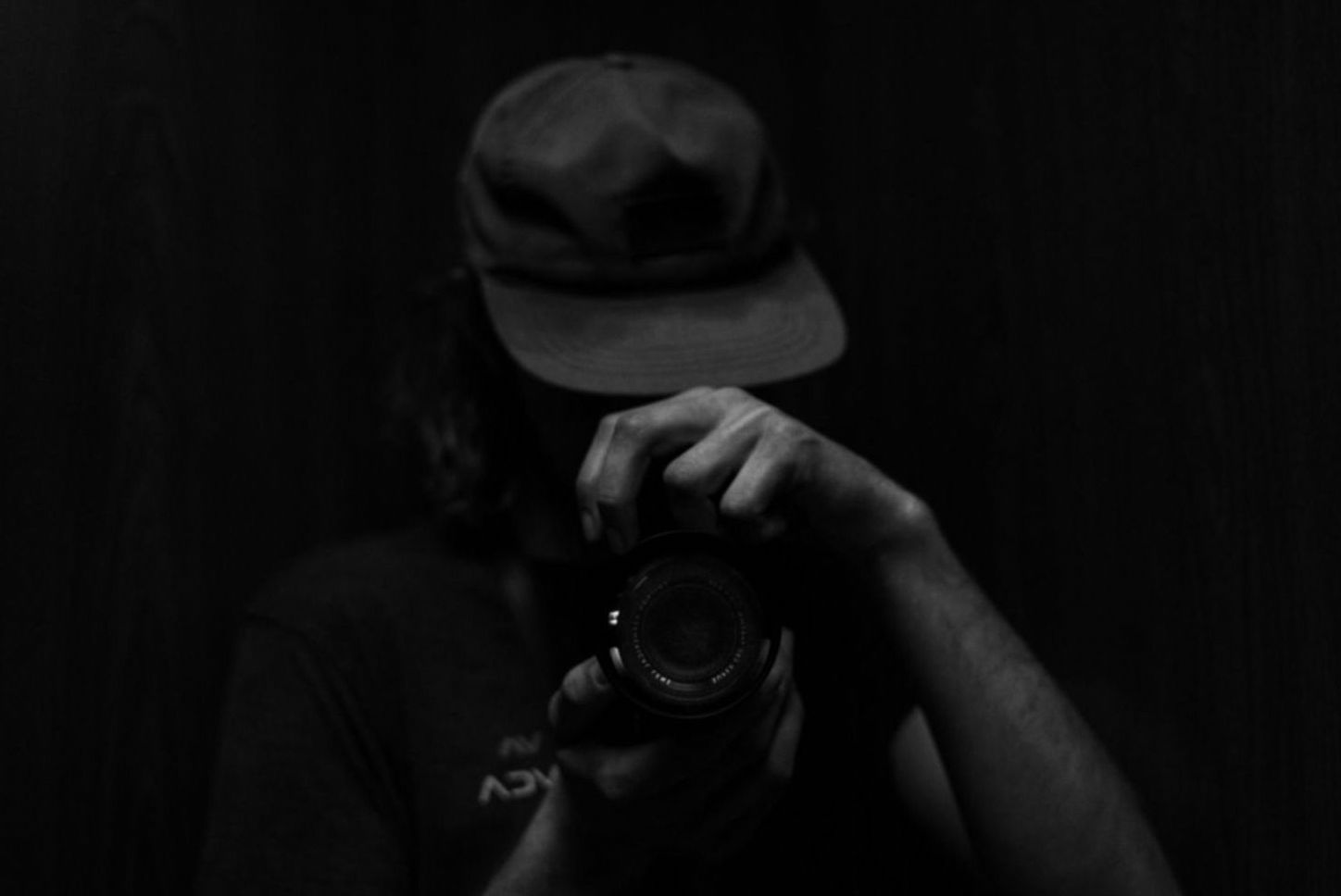Photographer working with natural window light